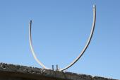 Large diameter concertina holder on concrete slab
